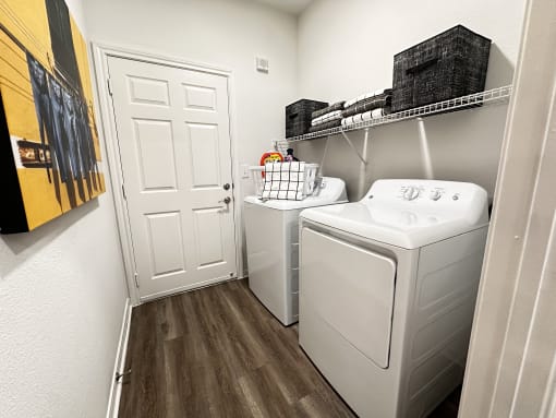 our apartments have a laundry room with a washer and dryer at Grand Villas Apartments, Katy