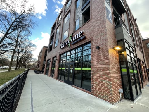 a brick building with a sign on the side of it at The MK, Indianapolis, 46220