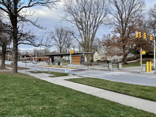 a city street with a crosswalk and a traffic light at The MK, Indianapolis, 46220
