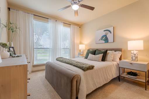 Bedroom with ceiling fan at Imperial Lofts, Texas, 77498