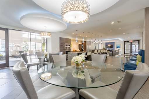 Dining room with Glass table at Imperial Lofts, Sugar Land, TX