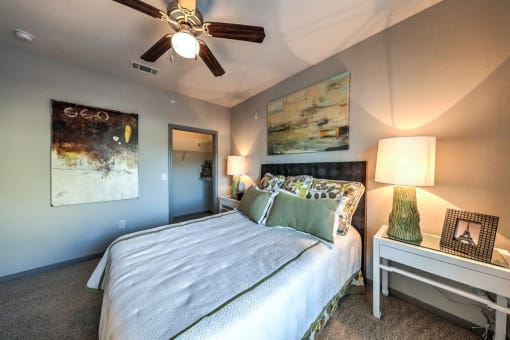 a bedroom with a bed and a ceiling fan at Waterstone at Cinco Ranch, Katy, TX, 77450