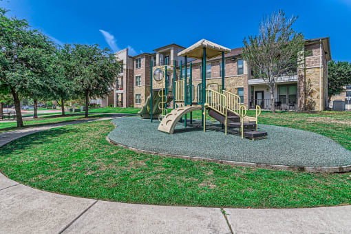 our apartments have a playground for kids to play at Discovery at Craig Ranch, Texas, 75070
