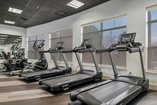 the gym is equipped with treadmills and ellipticals at CityView, North Kansas City, MO, 64116