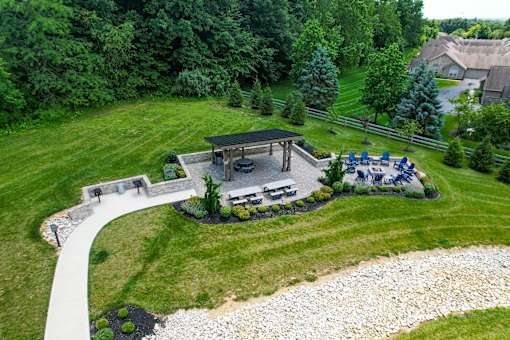 A backyard with a gazebo and a patio area. at Overland Park, Pickerington, OH, 43147