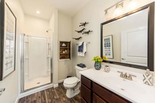 vanity and shower in bathroom at Overland Park, Pickerington, 43147