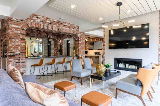 Resident Lounge With TV And Fireplace at Penn Circle, Carmel, IN, 46032