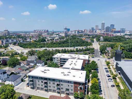 A cityscape with a large building in the foreground and a skyline in the distance. at Pinnex, Indianapolis, 46203