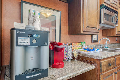 Kitchen with UV light sterilizer at Springhill Apartments, Kansas