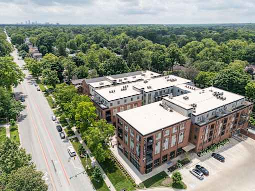A large building with a parking lot in front of it. at The MK, Indiana, 46220