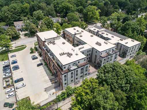 A large building with a parking lot in front of it. at The MK, Indiana, 46220