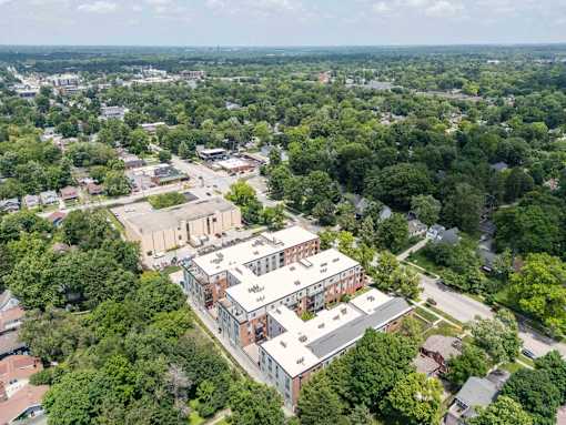 An aerial view of a large building surrounded by trees. at The MK, Indiana