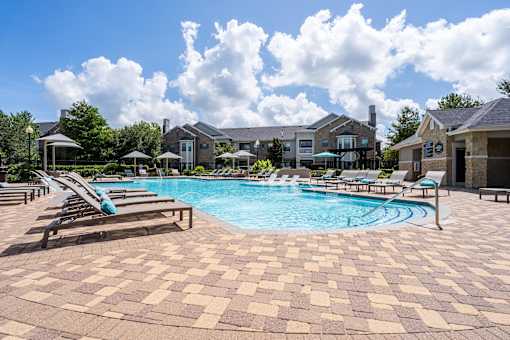 Pool Along with sitting area at Waterstone at Cinco Ranch Apartments, Katy, 77450