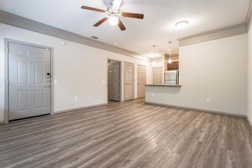 Empty room with Wooden Carpet at Waterstone at Cinco Ranch Apartments, Texas