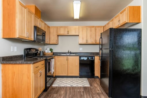 Kitchen with ample cabinets and storage, plentiful countertop space