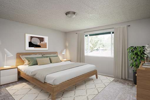 A bedroom with a large bed and a painting on the wall.