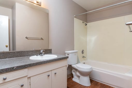 Bathroom with white cabinets