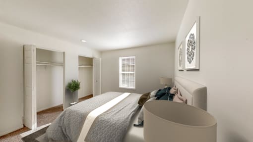 a bedroom with a large bed and a closet