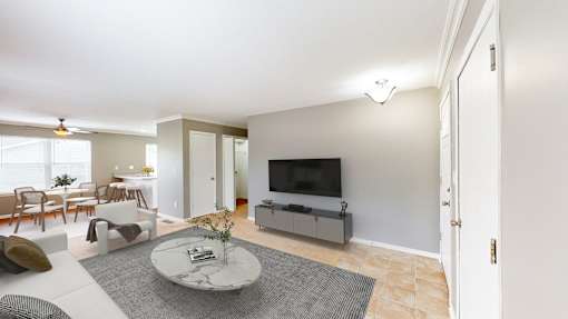 a living room with a couch and a table