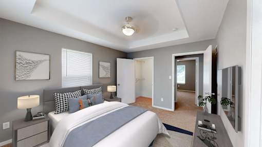 a bedroom with a large bed and a closet