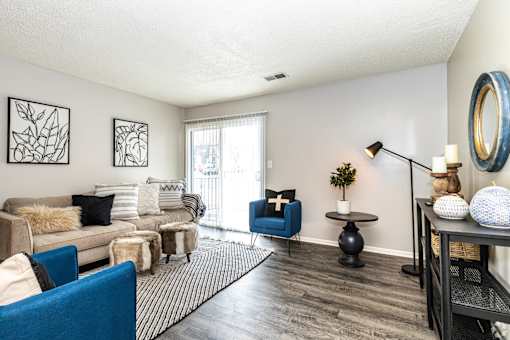 a living room with a couch and a table