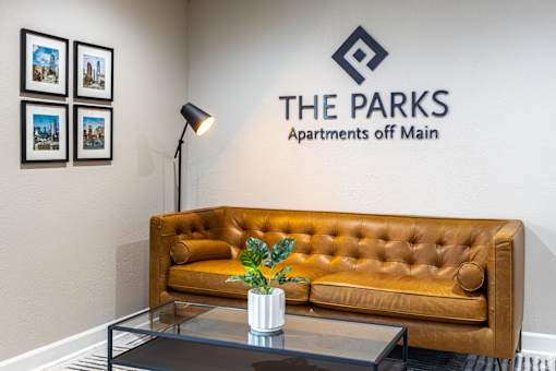 the parks apartments of main lobby with couch and coffee table