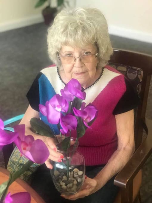Lady With Flowerpot at Savannah Court of Brandon, Florida