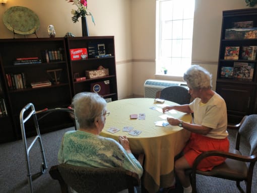 Seniors Engaged In A Activity at Hibiscus Court, Melbourne, Florida