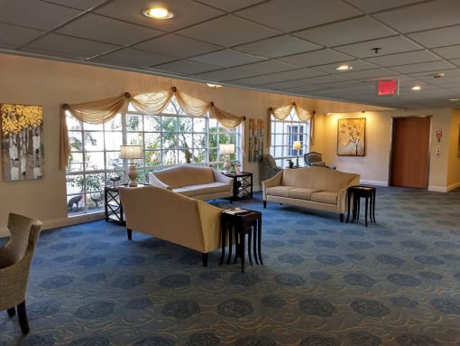 Living room with sofas at Savannah Grand of Sarasota, Sarasota, FL