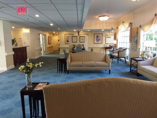 Living room with sofa and lights decor at Savannah Grand of Sarasota, Sarasota, FL, 34238