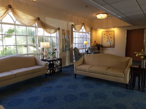 Living room with sofa and lights at Savannah Grand of Sarasota, Florida, 34238