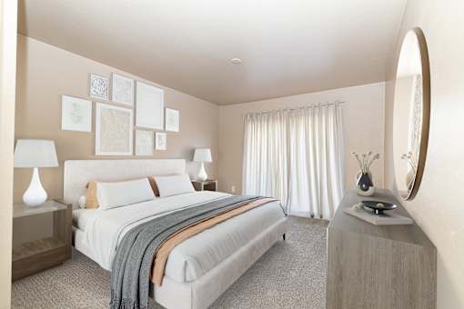 A bedroom with a large bed and a round mirror on the wall.