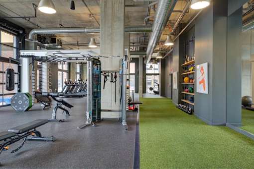 a gym with a bunch of exercise equipment in it at The Audubon New Haven, Connecticut