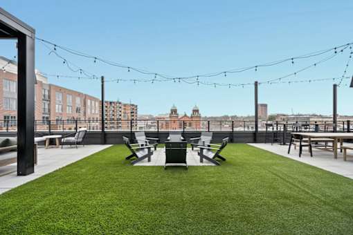 a yard with a table and chairs on top of a roof at The Audubon New Haven, New Haven, CT, 06511