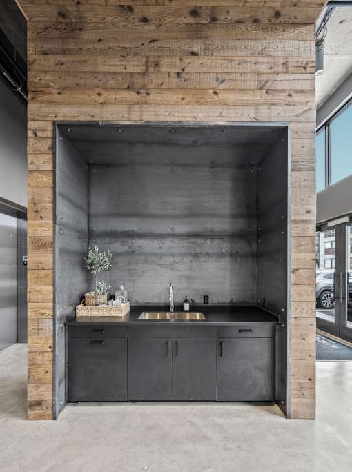 A kitchen with a sink and a countertop.