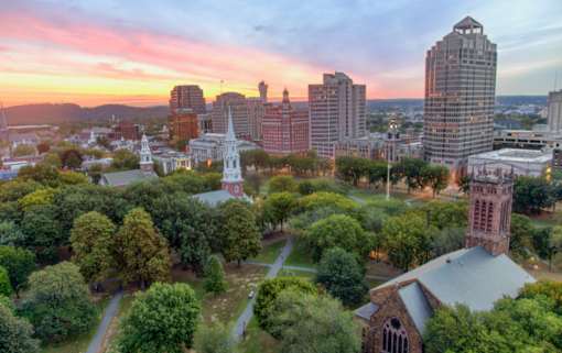 an aerial view of the city at sunset at The Audubon New Haven, Connecticut