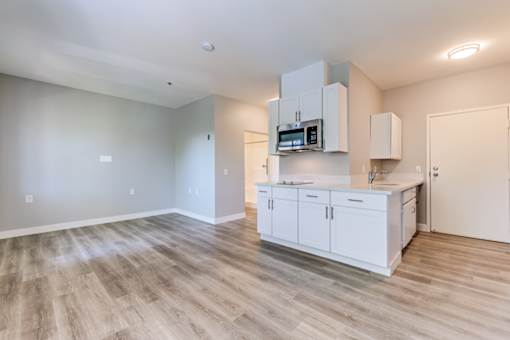 Kitchen with wooden floor at Azure Point at Encinitas - 55+ Active Adult Apartments, Encinitas, CA, 92024