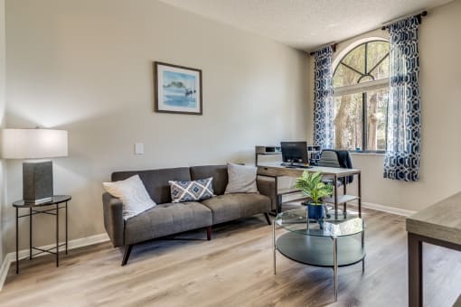 model apartment living room with couch and coffee table