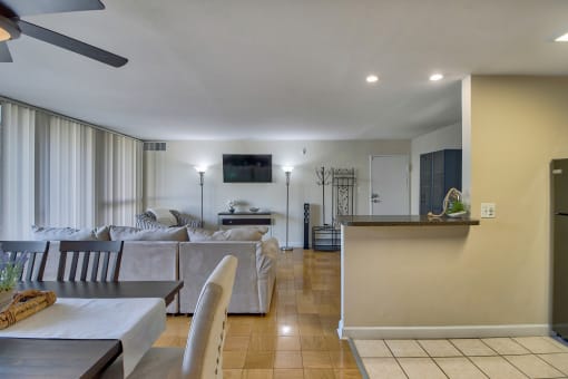 a view of the living room and dining room from the kitchen