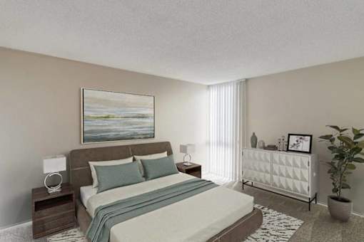 A bedroom with a large bed and a white dresser.