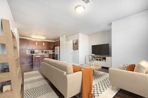 A living room with a couch and a television.