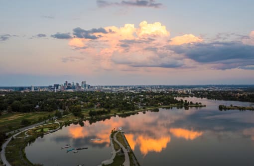 an aerial view of the city of calgary at sunset