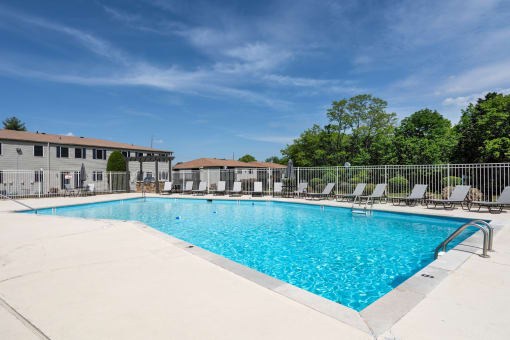 our apartments have a resort style pool with lounge chairs