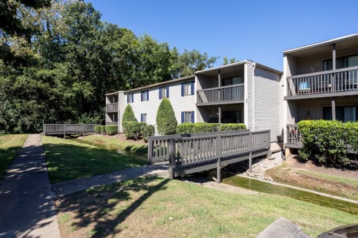 the avenues exterior view of apartment buildings with walkways and balconies