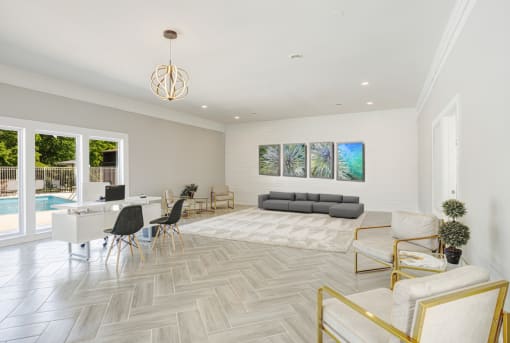 a living room and dining room with a couch and a table