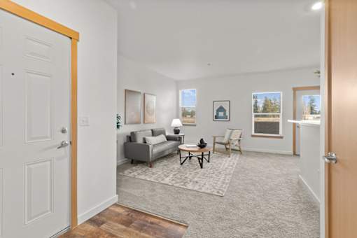 Spacious carpeted Living Room at Tustin Apartment Homes, Yelm, WA, Washington
