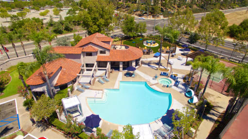 Apartments in Temecula, CA - Vista Promenade Sparkling Swimming Pool Surrounded By Lush Landscaping and Lounge Seating