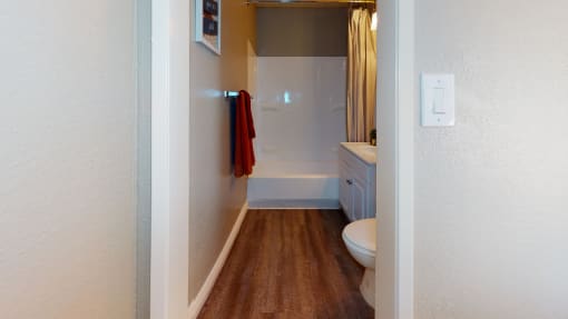 Apartments for Rent in Colton, CA - Las Brisas Apartment Bathroom with Tub and Shower Combo and Single Vanity