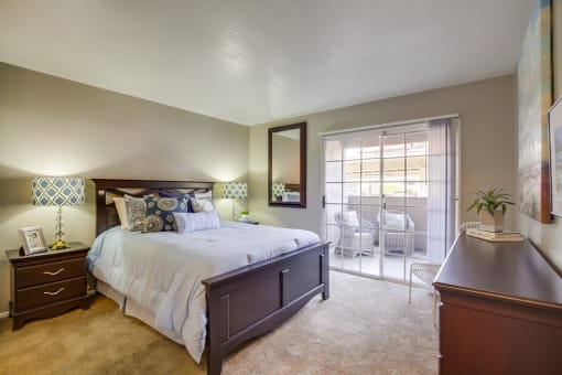 One-Bedroom Apartments in Temecula, CA- Vista Promenade- Wall-to-Wall Carpeting with Entrance to Patio and Stylish Decor