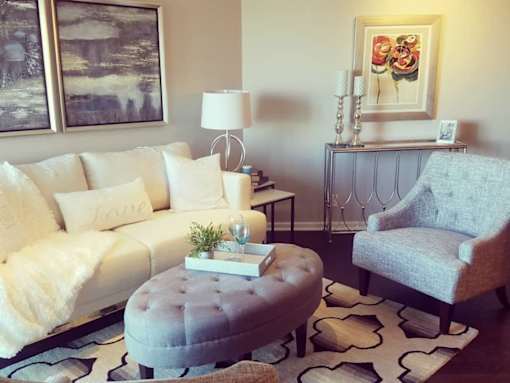 a living room with a couch and a chair